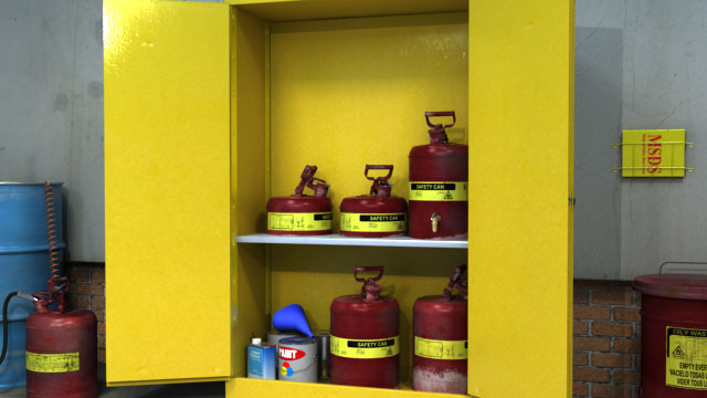 在防火易燃液体储存柜或房间内放置装有易燃液体的安全罐。